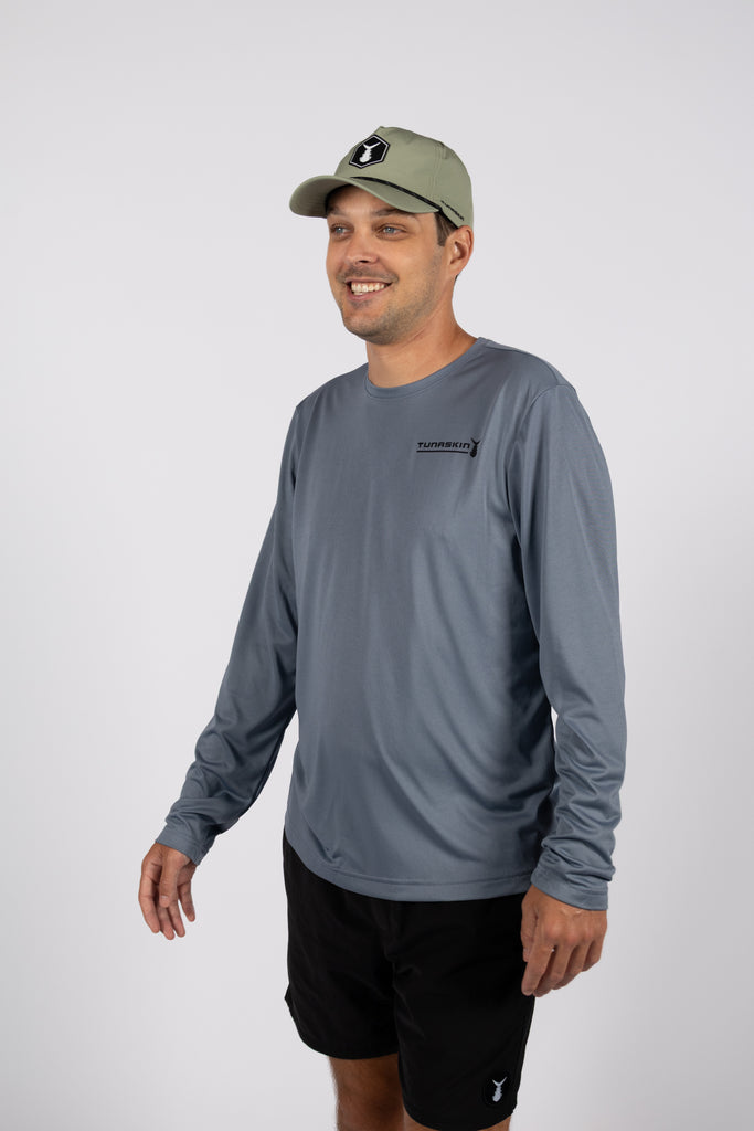 model wearing long sleeve TSK-LSE-42-CHRDS-01  charcoal shirt with left chest logo