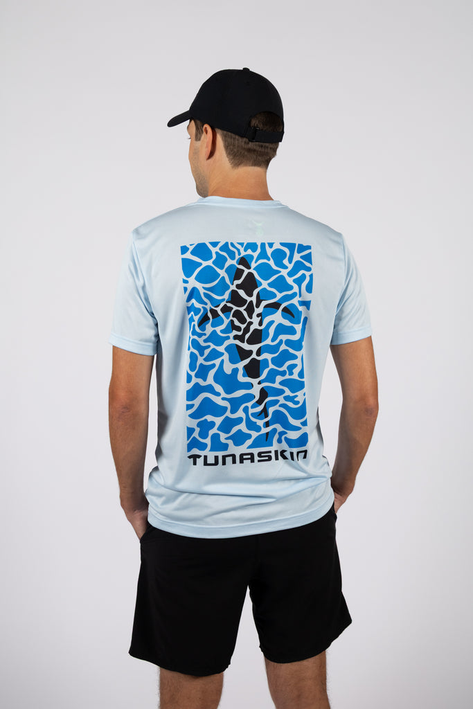 model wearing TSK-SSE-53-ICEDS-01 shirt with back illustration of tuna swimming