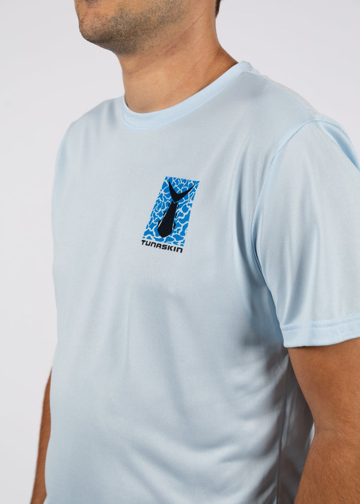 close up of TSK-SSE-53-ICEDS-01 shirt with small left chest logo on ice blue shirt