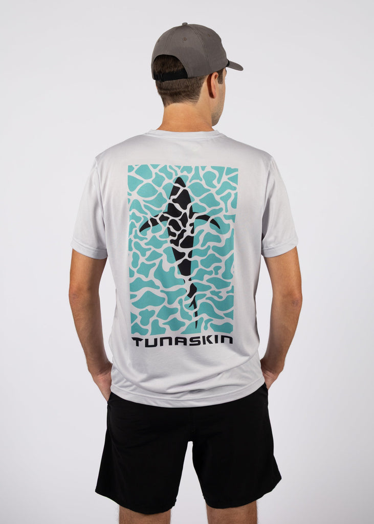 model wearing TSK-SSE-53-SVRDS-01 shirt with tuna swimming design on back