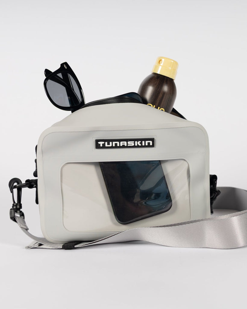 Gray Tunaskin board bag with 'TUNASKIN' branding on a white background