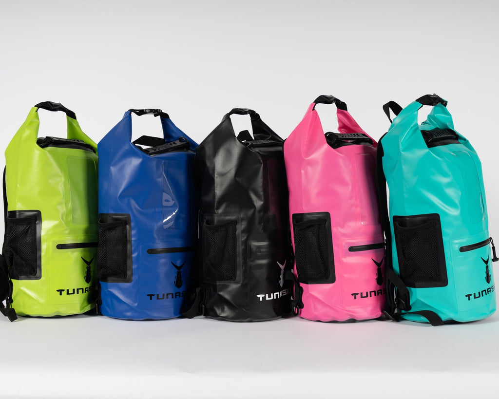 Five colorful dry bags with visible Tunaskin branding on a white background